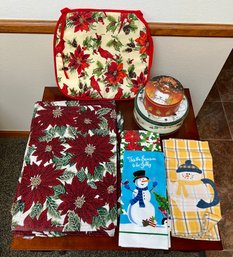 Lot Of Christmas Items - 8 Placemats - Tins - Dish Towels - Chair Cushion