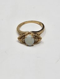 10K GOLD RING WITH GEMSTONE  INSCRIBED 'KIMBERLY '