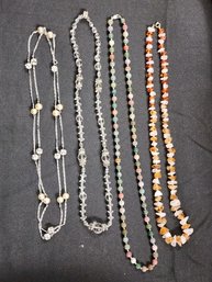 ASSORTED COLLECTION OF VTG BEADED NECKLACES