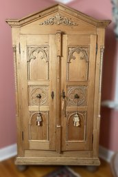 ANTIQUE HAND CARVED ARMOIRE WITH FABRIC LINED INTERIOR