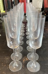 COLLECTION OF LONG STEM CHAMPAGNE GLASSES