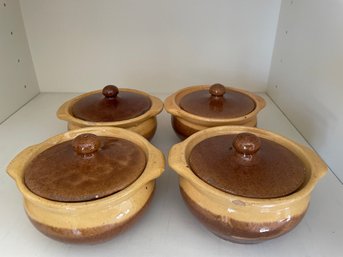 SET OF FOUR FRENCH GLAZED STONEWARE COVERED POTS