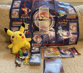 COLLECTION OF POKEMON CARDS, FIGURINES AND CARD GAMEBOARD