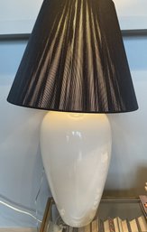 WHITE CERAMIC TABLE LAMP WITH BLACK SHADE CLEAR ROUND FINIAL