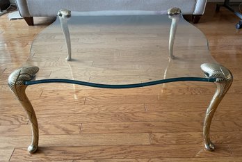 HOLLYWOOD REGENCY BRASS AND GLASS COFFEE TABLE