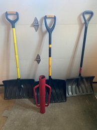 COLLECTION OF SHOVELS AND FENCE POST DRIVER