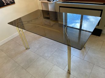 MCM GLASS TOP DINING TABLE IN THE STYLE OF MILO BAUGHMAN