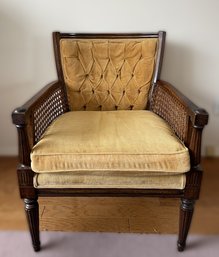 MCM CANED GOLD TUFTED ARM CHAIR
