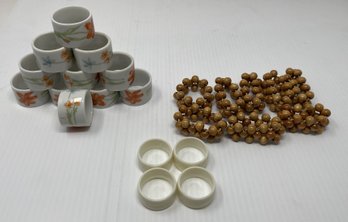 ASSORTED COLLECTION OF PORCELAIN AND BEADED NAPKIN RINGS
