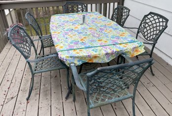 VINTAGE ALUMINUM GLASS TOP PATIO TABLE WITH 6 ARMCHAIRS