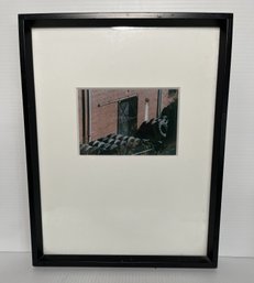 FRAMED PHOTOGRAPHIC PRINT OF TIRE SHOP