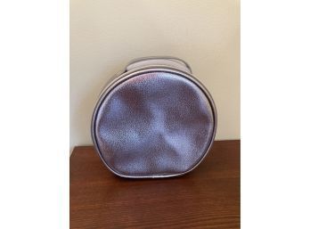 METTALIC COSMETIC BAG INCLUDING UNUSED SAMPLES  BY TWILLY D'HERMES AND OTHERS