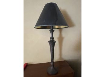Table Lamp With Textured Metal Base And Black Lamp Shade.