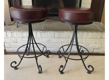 PAIR OF ANTIQUE STEEL AND LEATHER SWIVEL BAR STOOLS