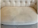 CREAM COLORED CHESTERFIELD LOVESEAT BY PIER 1 IMPORTS