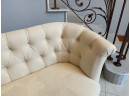 CREAM COLORED CHESTERFIELD LOVESEAT BY PIER 1 IMPORTS