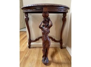 VINTAGE DEMILUNE SIDE TABLE WITH HAND CARVING OF  WOMAN ON LEG