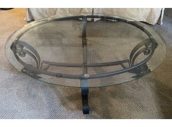 BEVELLED OVAL GLASS TOP COFFEE TABLE ON METAL BASE
