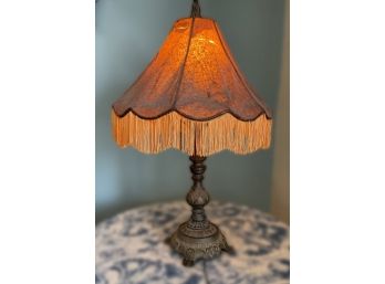BRASS TABLE LAMP WITH FRINGED SHADE
