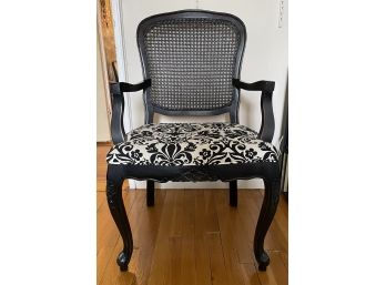 BLACK AND WHITE UPHOLSTERED CANEBACK ARMCHAIR