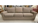 1980S 3 SEATER BEIGE UPHOLSTERED SOFA IN STYLE OF MILO BAUGHMAN