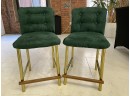 PAIR OF GREEN VELVET COUNTERTOP STOOLS WITH BRASS AND WOOD DETAIL