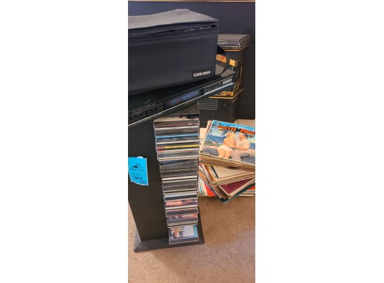 CD's, Records And More