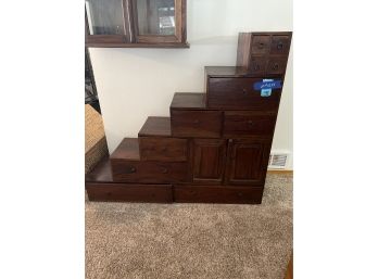 Stair Case Style Chest Of Drawers With 11 Drawers And 2 Cabinet Doors, Contents Included