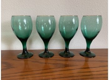 Green Toned Wine Glasses With Gold Rim
