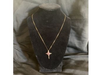 9k 375 Italy Gold Cross Necklace With Tanzanite?