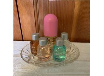 Perfumes From The Body Shop And Love's Baby Soft On Glass Dish