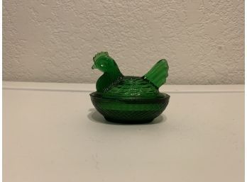 Miniature Green Hen On A Nest