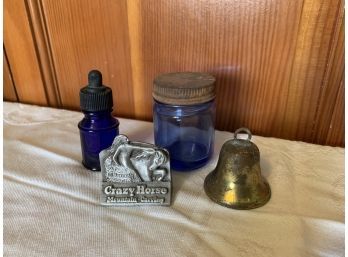 Blue Glass Containers, Bell, And Crazy Horse Mountain Carving Souvenir