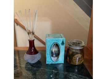 Candle, Reed Diffuser, And An Ornament