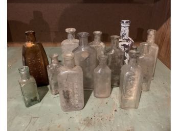 Small Apothecary Bottles Including One From Longmont