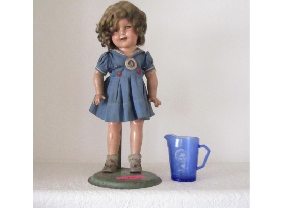 The Worlds Most Darling Genuine Shirley Temple Doll With Stand And Small Blue Pitcher