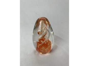 Egg Shaped Paperweight Orange Lower Into A Clear Swirl