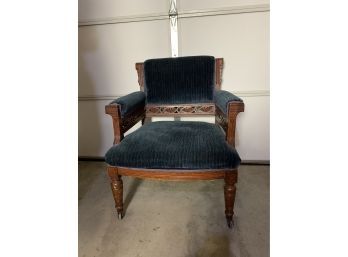 Antique Carved Wood Upholstered Chair On Castors