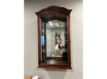 Collectors Cabinet By Howard Miller Wall Hanging Curio Cabinet