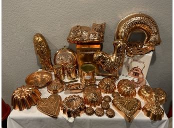 Large Assortment Of Copper Molds And A Teapot