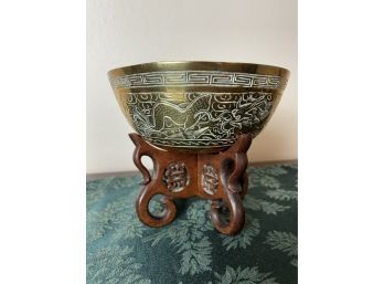 Brass Bowl With Boat And Dragon Design On Wood Stand