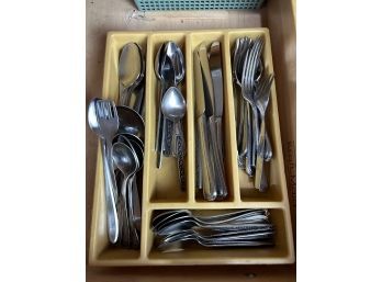 Assortment Of Flatware In Organizing Tray