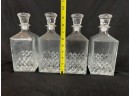 Group Of Four Identical Couvoisier Decanters