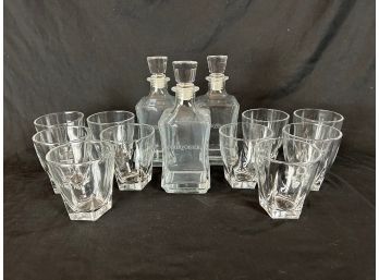 Three Couvoisier Decanters And Ten Glasses