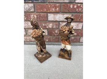Paper Mache Figurines Holding Baskets With Beans And Peanuts