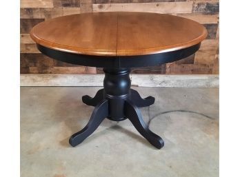 Round Pedestal Dining Table With Self Storing Leaf