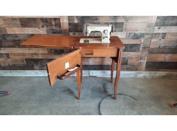 Vintage Sewing Machine In Cabinet