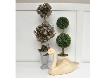 Topiaries And Wooden Swan