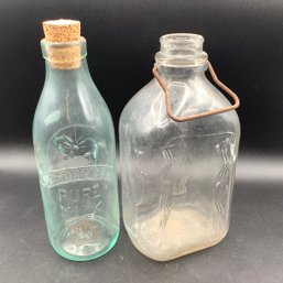 2 Antique Milk Bottles