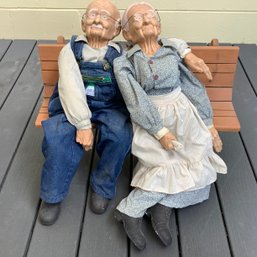 William Wallace Grandma And Grandpa Dolls On Wood Bench